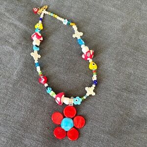 Colorful Beaded Necklace with Red Flower Pendant
